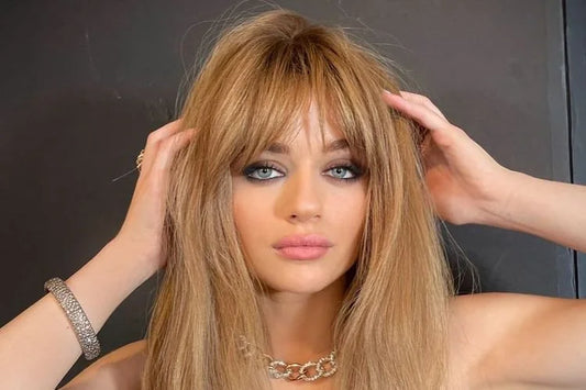 Long wispy Birkin bangs